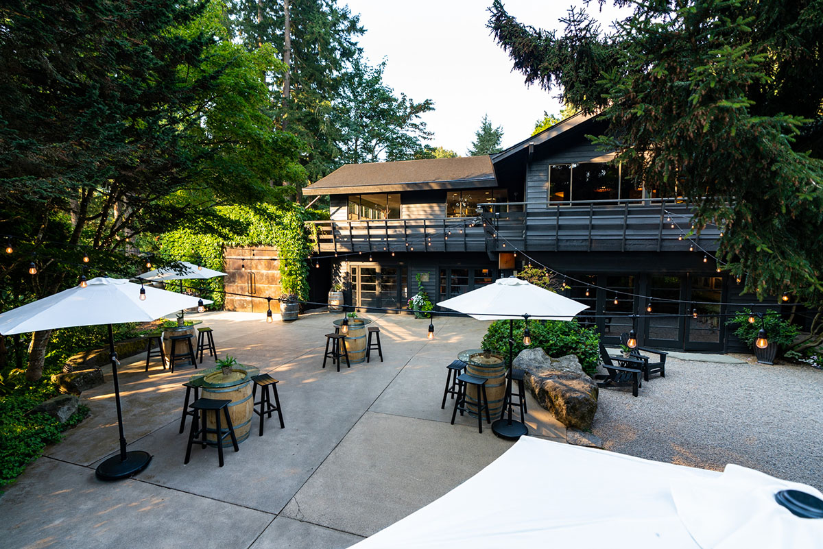 JM Cellars exterior building with patio wine tasting area