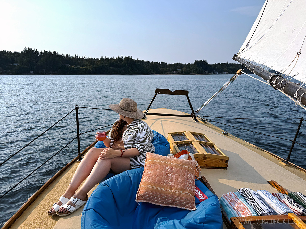 woman taking a sailboat ride, one of the best things to do in Olympia, WA