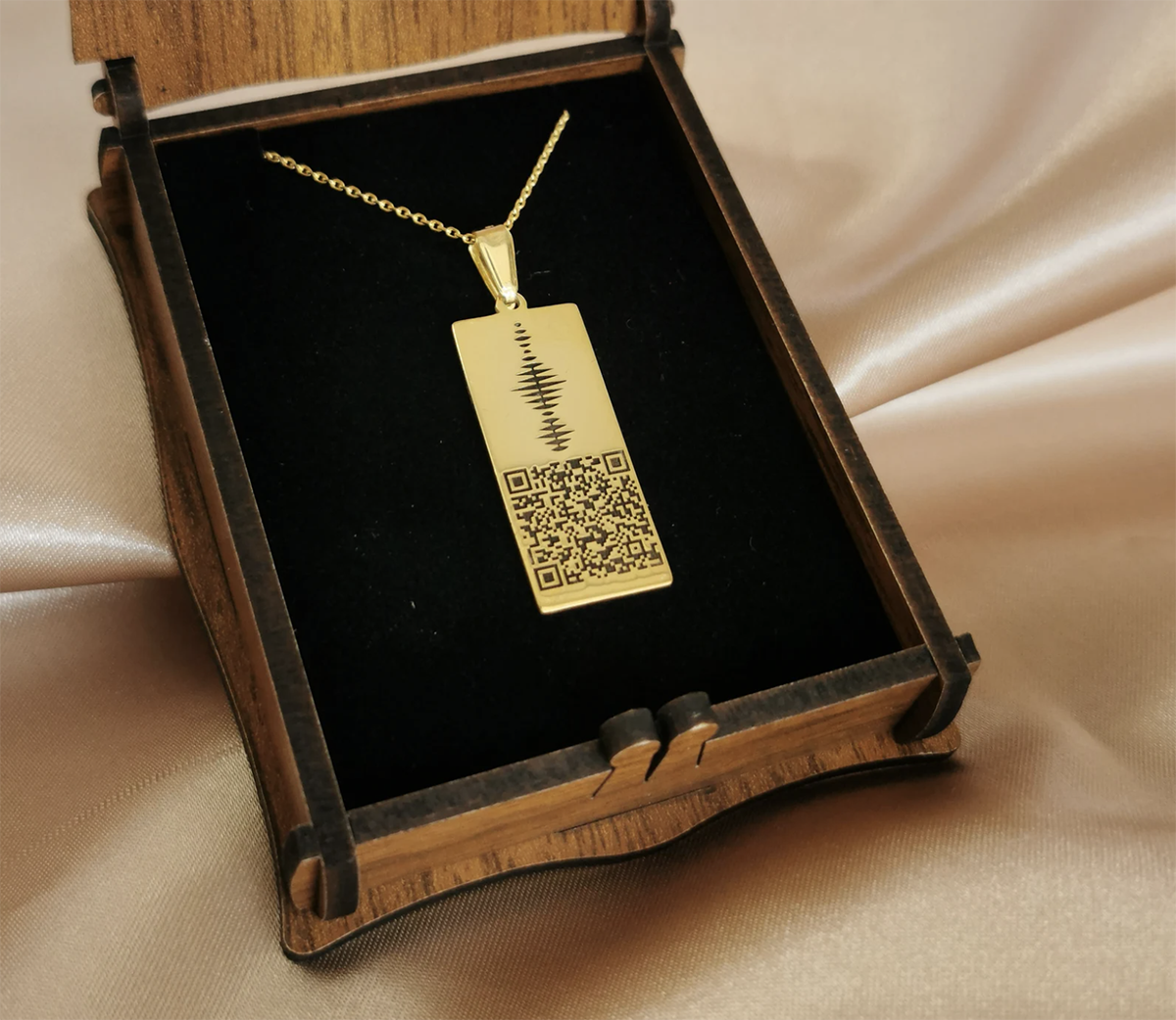 Jewelry box with a custom engraved necklace of a QR code