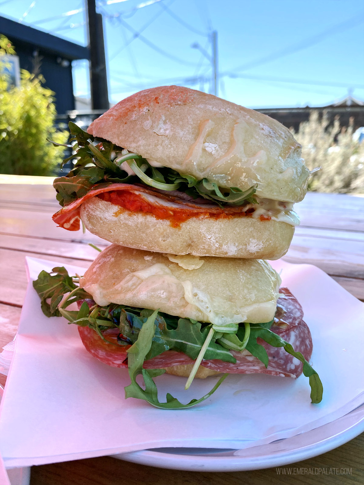 two Italian sandwiches stacked on top of each other from one of the hidden gem restaurants in Seattle