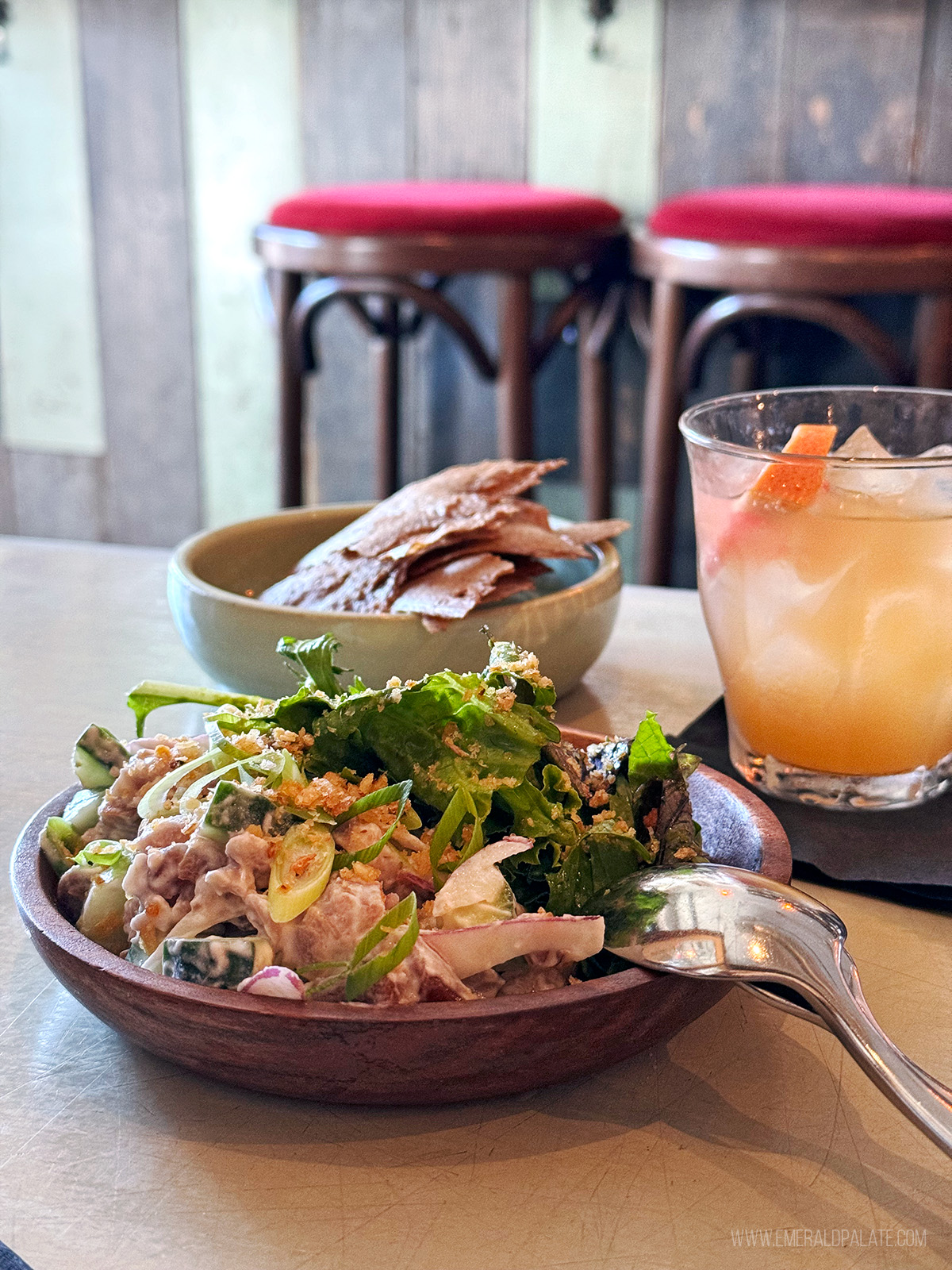 tuna ceviche with chips and a drink from a Vancouver bar