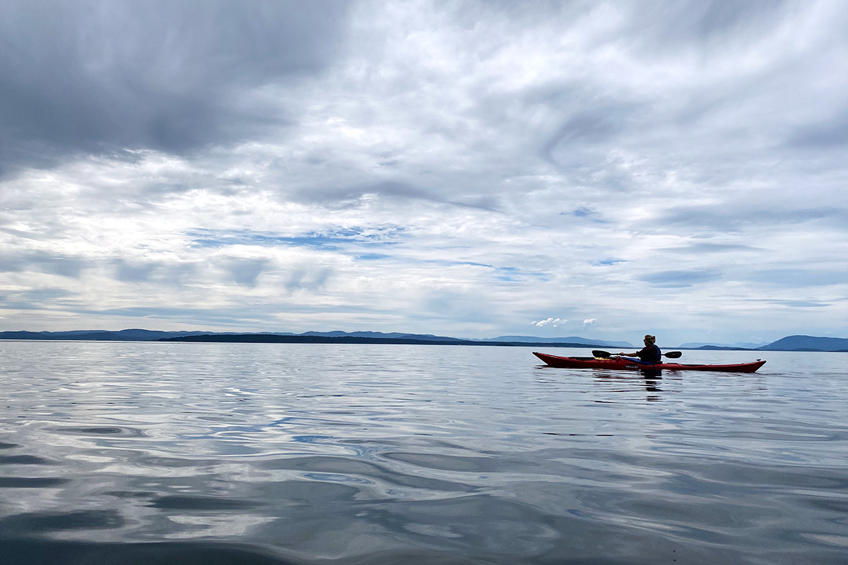 woman kayaking, one of the best Seattle water activities