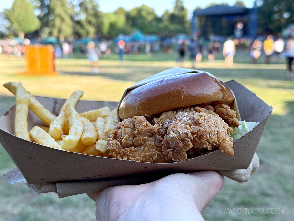 fried chicken sandwich with fries from one of the best food trucks in Seattle