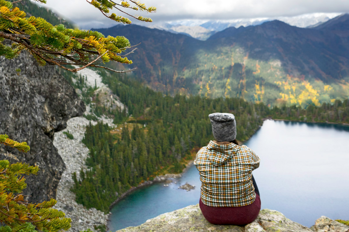 woman overlooking a vista on a hike, one of the best best things to do in Seattle in November