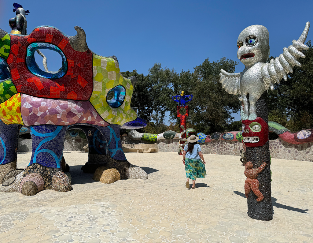 woman walking through colorful sculptures, one of the best outdoor activities in San Diego