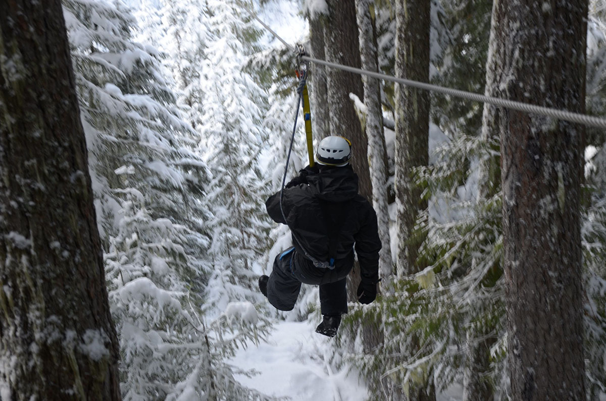 ziplining in the snow, one of the best activities in Whistler in winter