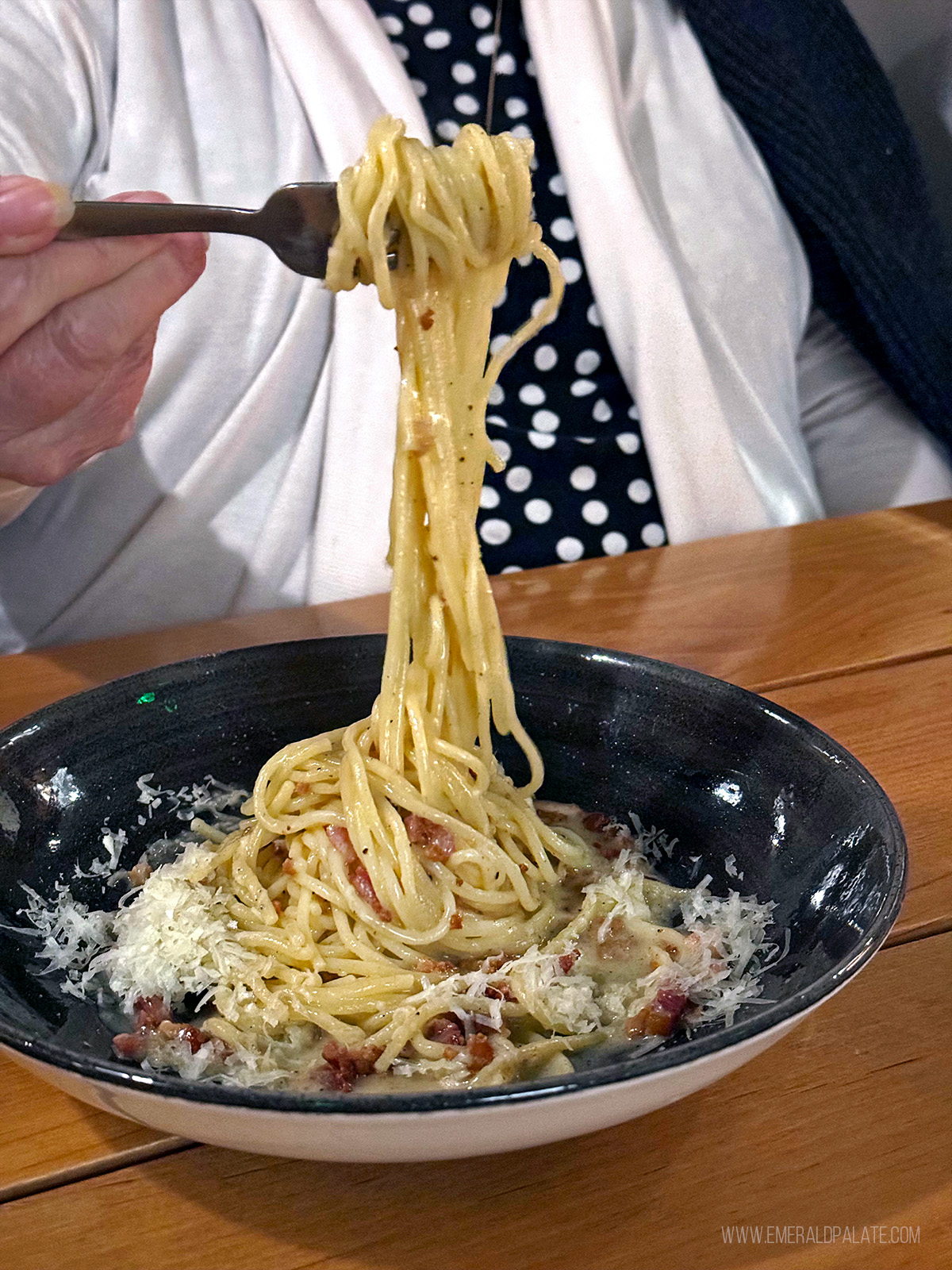 person picking up noodles from one of the best Walla Walla restaurants