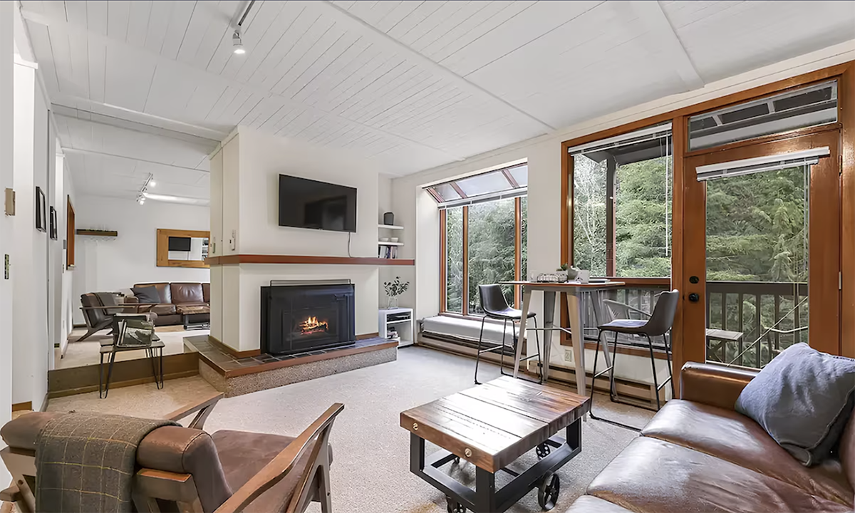 living room and fireplace inside a cabin at one of the Washington ski resorts