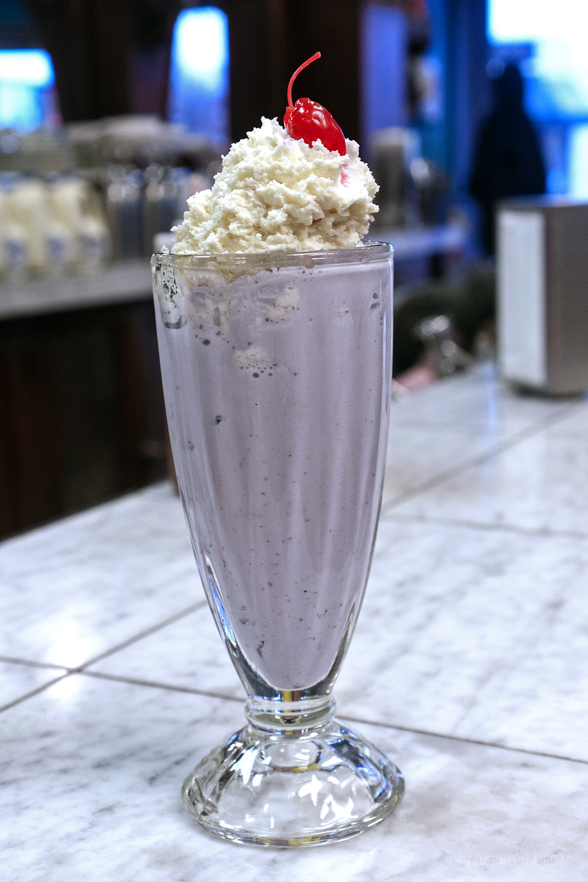 huckleberry shake with whipped cream and cherry from one of the best places to eat in Kalispell, Montana