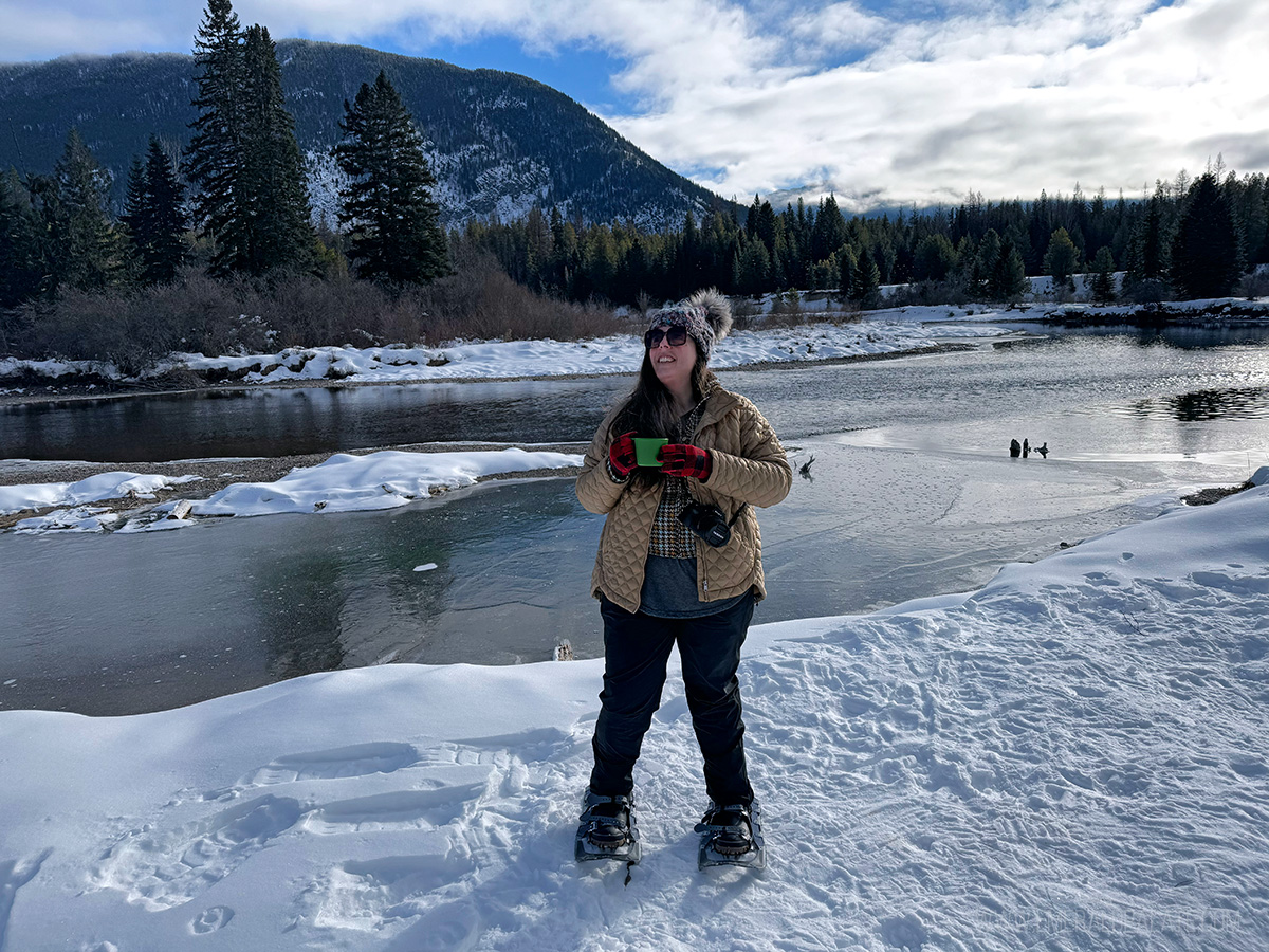 woman snowshoeing in Glacier National Park